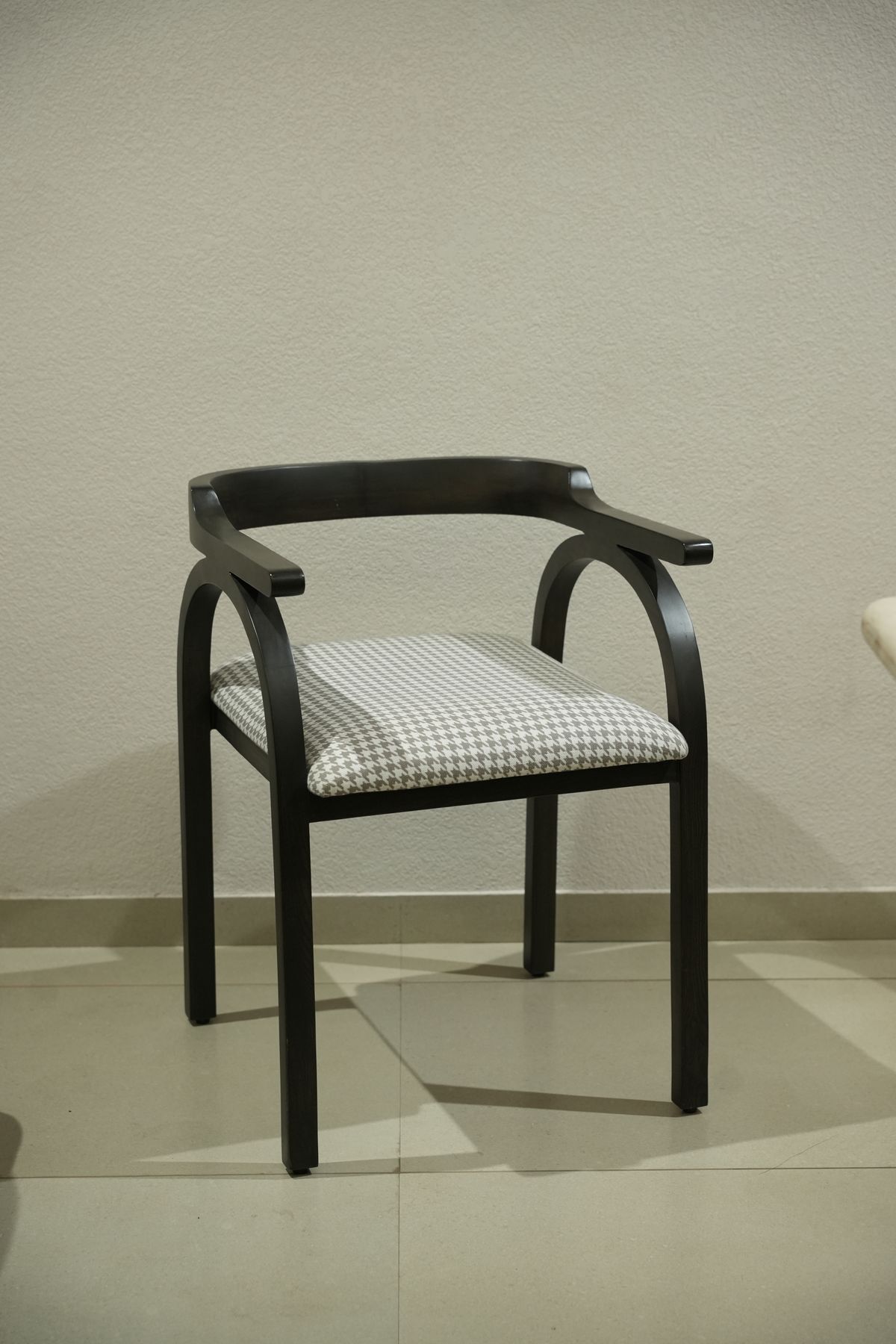 Custom-made houndstooth armchair by Drape Shoppe, Surat