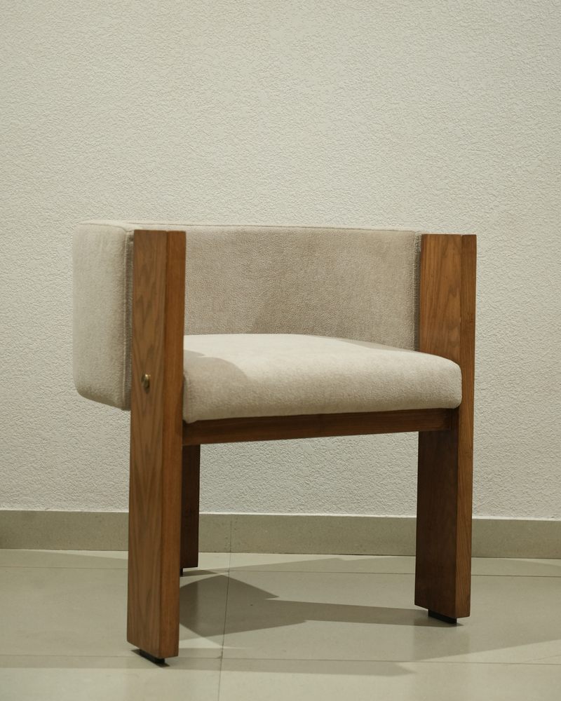 Custom-made walnut and boucle chair by Drape Shoppe