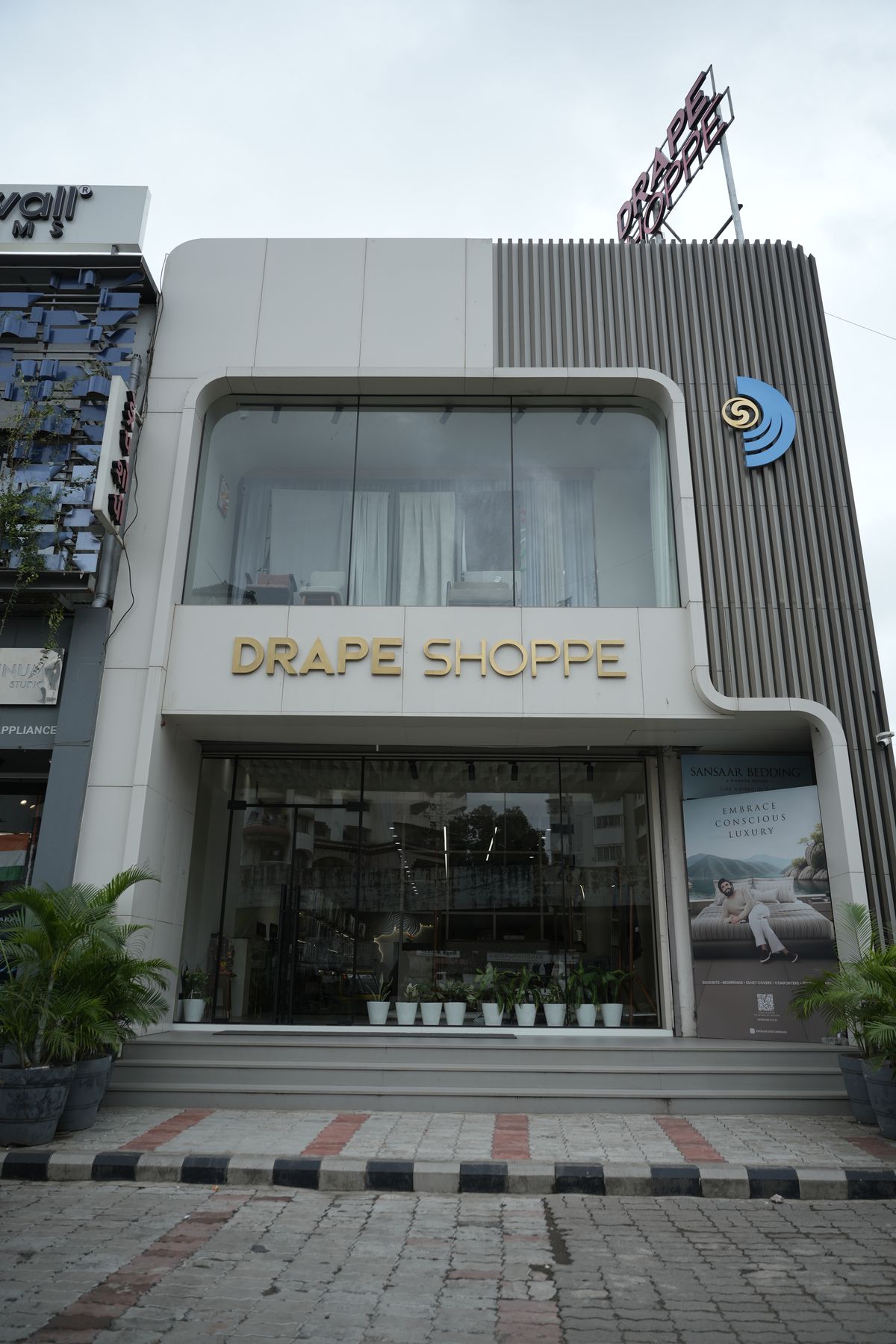 Drape Shoppe showroom exterior at Bhatar Char Rasta, Surat