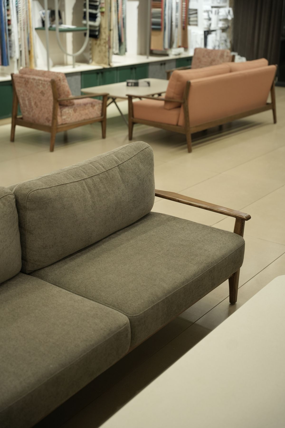Upholstered sofa seating inside the Drape Shoppe showroom